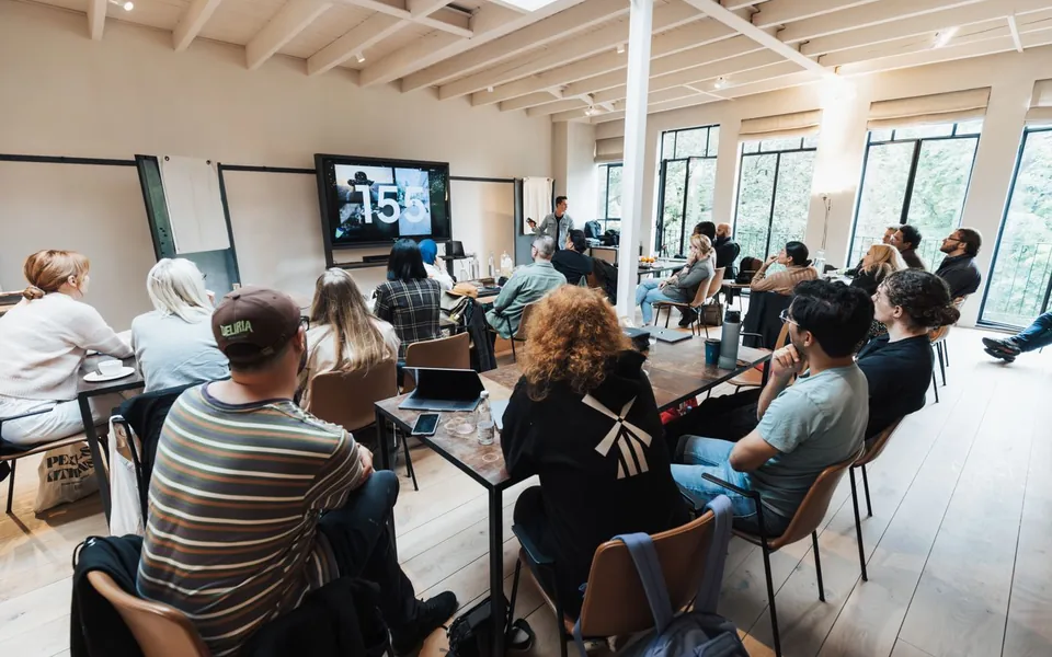 Illustrative photo: Learning & Talks (not actual attendees)